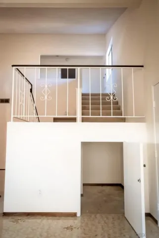 a black and white photo of a house