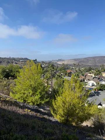 a view of a lake with mountains in the background