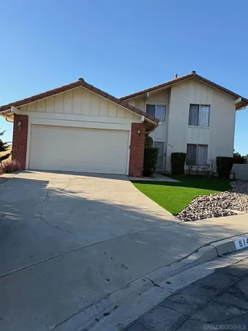 a view of front of house with garage