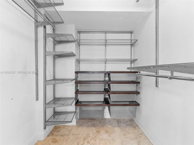 a view of a room with racks on the wall