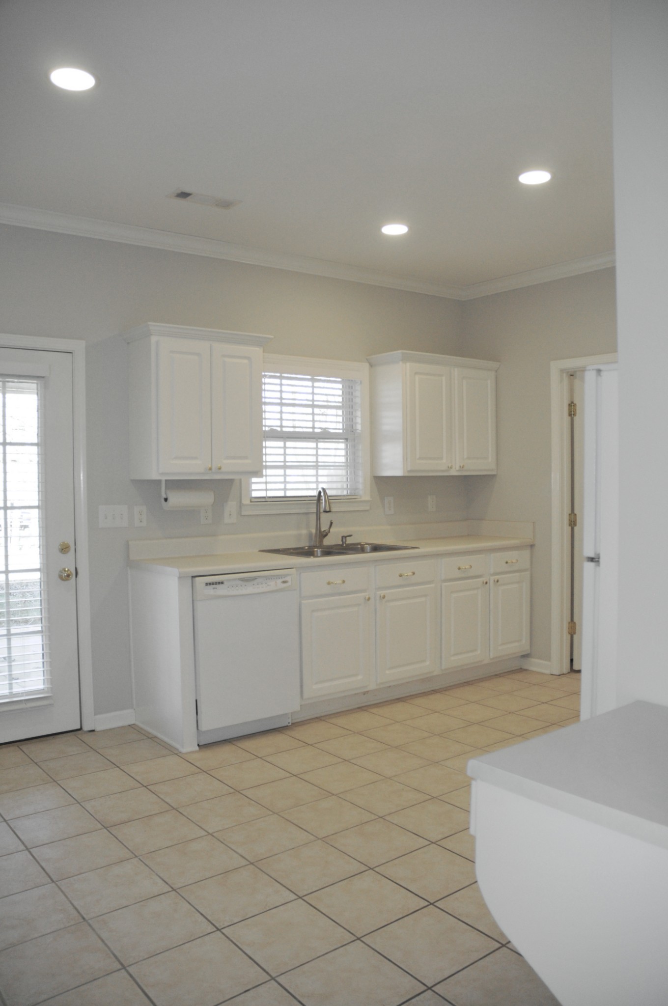 7101 Fernvale Springs Way Fairview, TN 37062 - Photo 11 of 18 a kitchen with a white cabinets and window