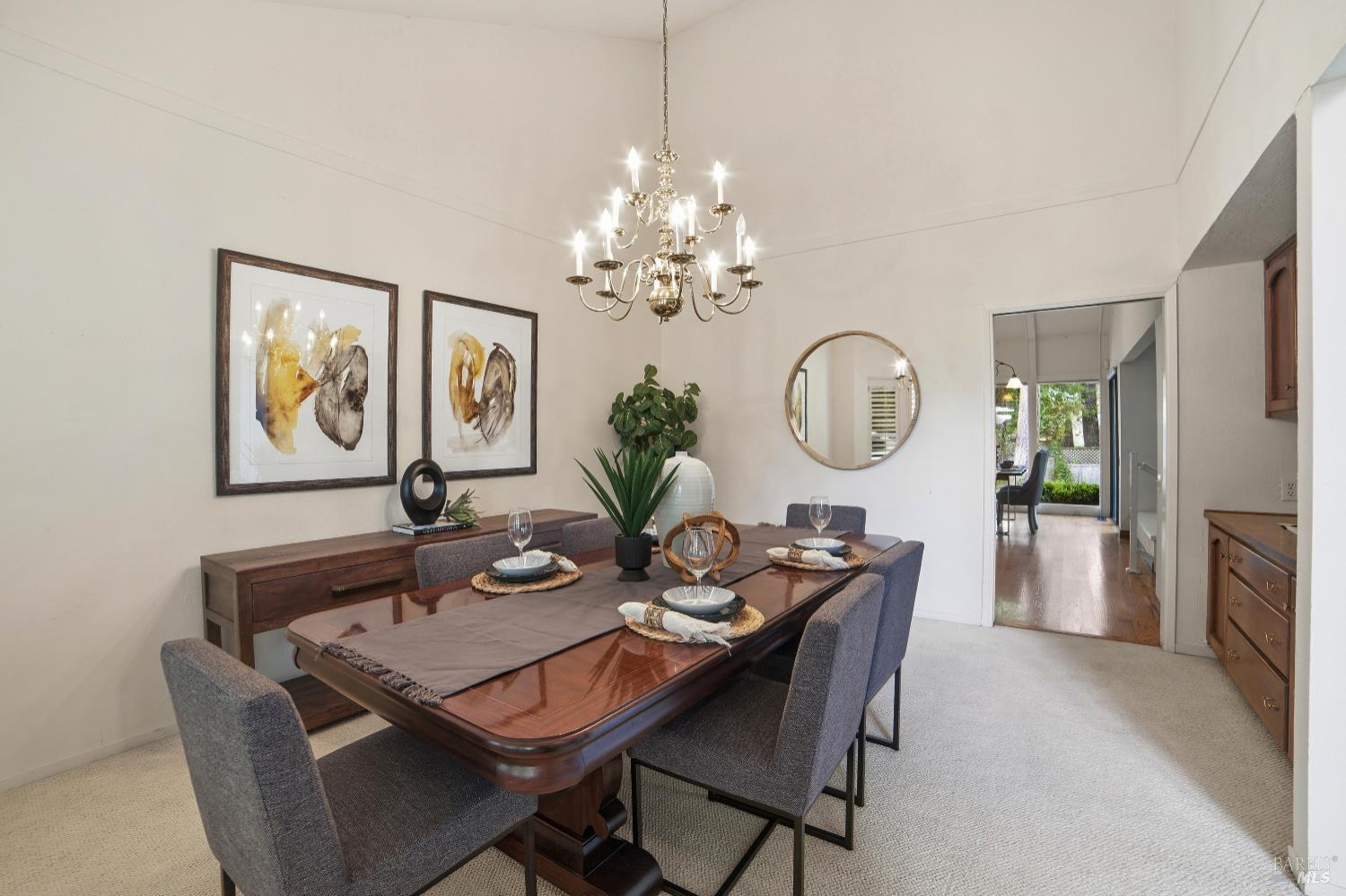 2656 Fir Park Way Santa Rosa, CA 95404 - Photo 19 of 51 a dining room with furniture a livingroom and a chandelier