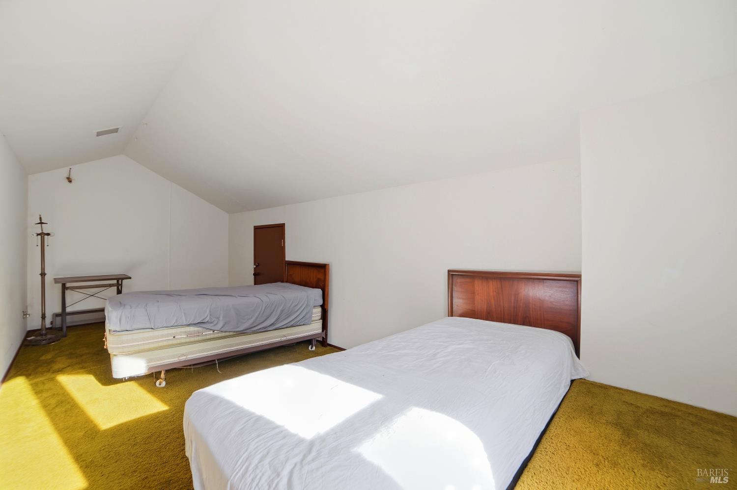 2656 Fir Park Way Santa Rosa, CA 95404 - Photo 23 of 51 a bedroom with two beds and painted walls