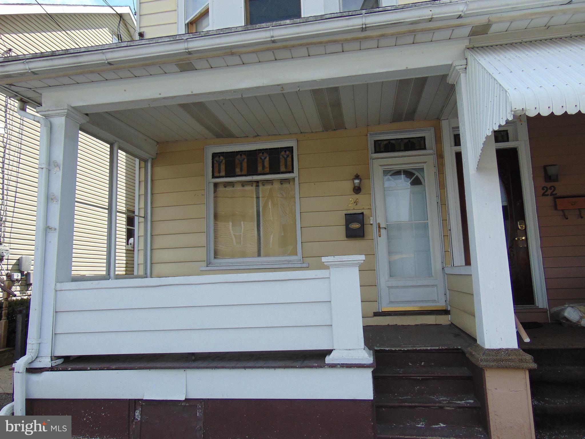 24 East Ridge Street Coaldale, PA 18218 - Photo 5 of 38 a front view of a house with a window