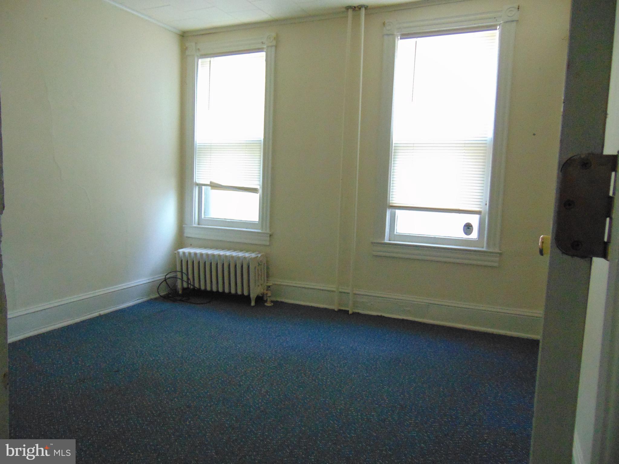 24 East Ridge Street Coaldale, PA 18218 - Photo 8 of 38 a view of an empty room and a window