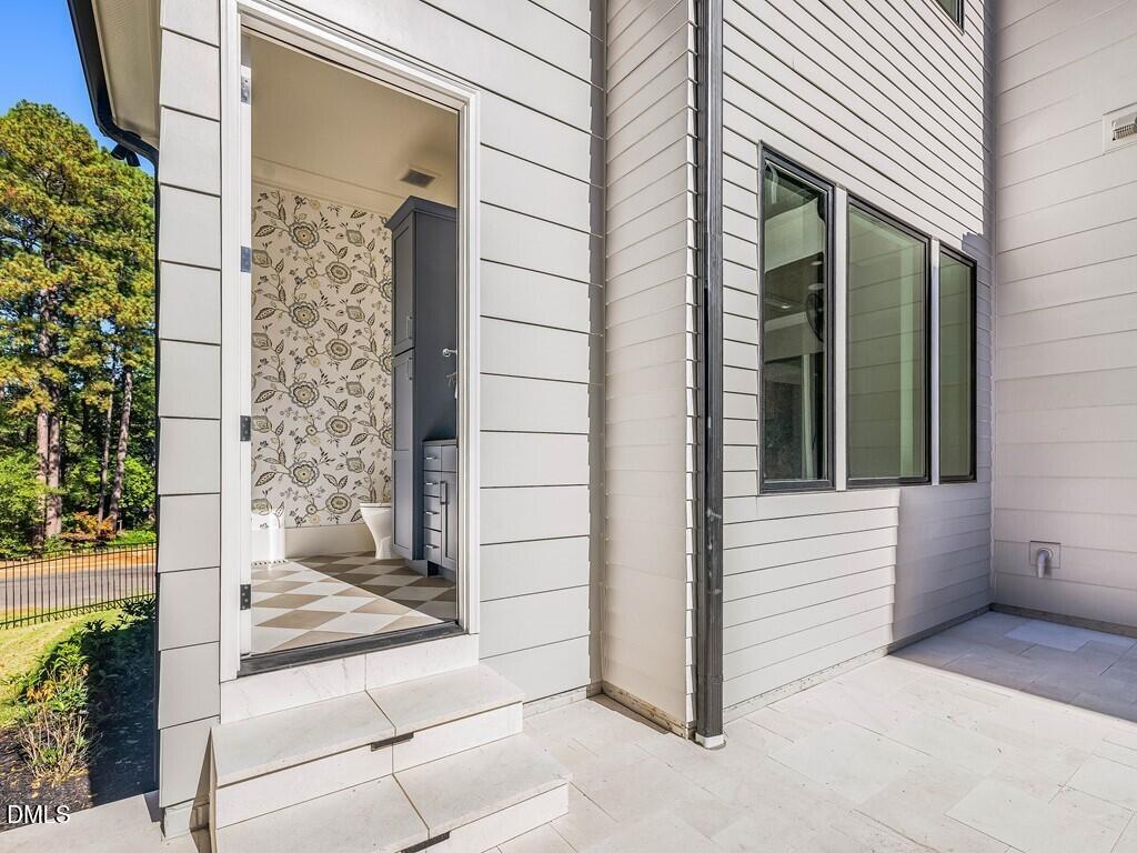 7013 Buckhead Drive Raleigh, NC 27615 - Photo 69 of 80 a view of a entryway door of the house