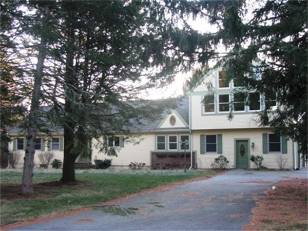 6 Roundtop Road Boxford, MA 01921 - Photo 1 of 1 a front view of a house with a yard and trees