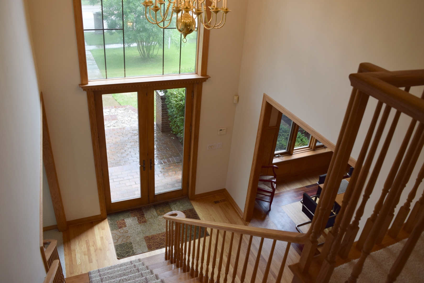 421 Lewis Road Geneva, IL 60134 - Photo 3 of 17 a view of an entryway with a small yard