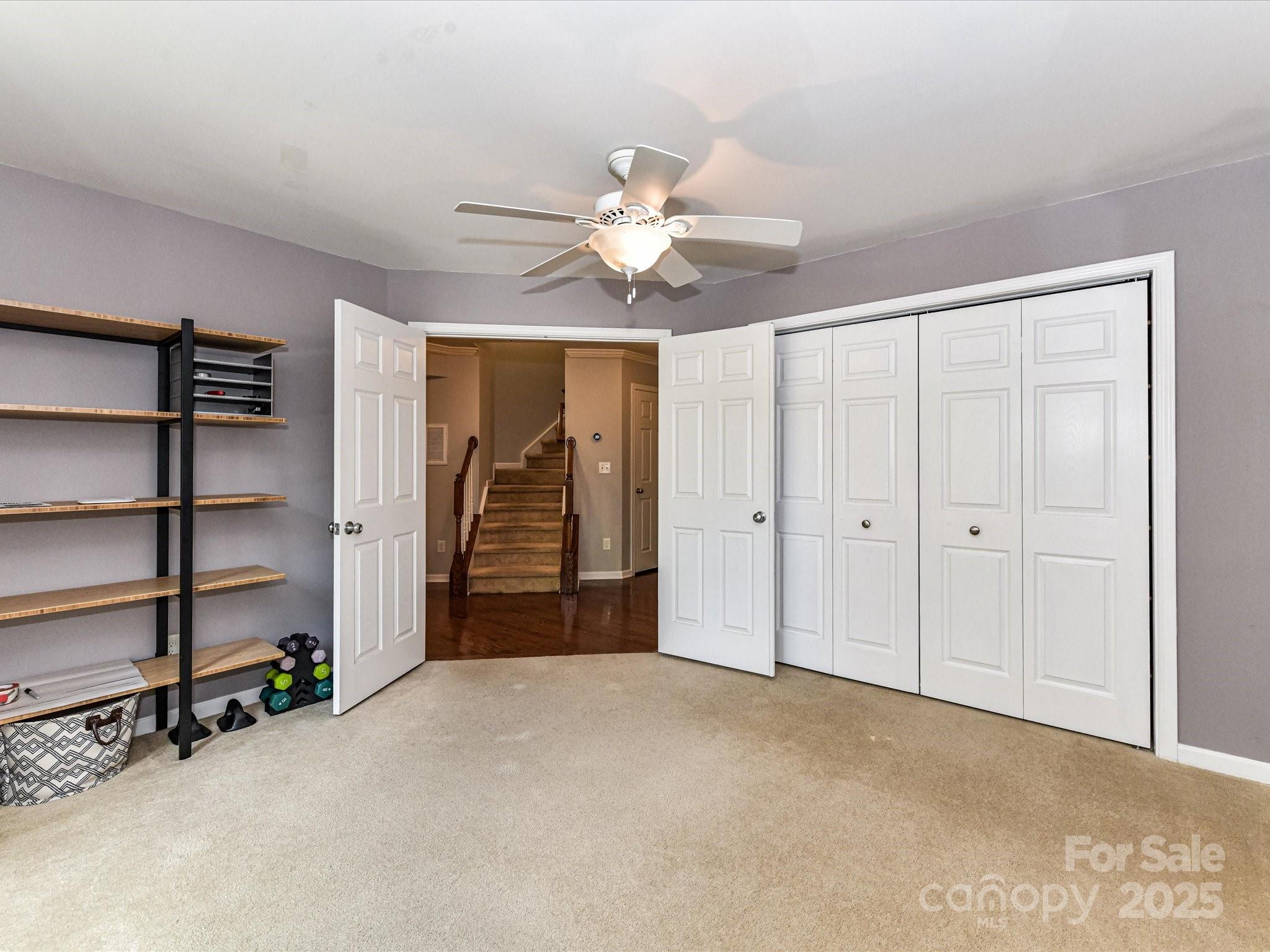 756 Naramore Street Davidson, NC 28036 - Photo 11 of 46 a view of empty room with ceiling fan