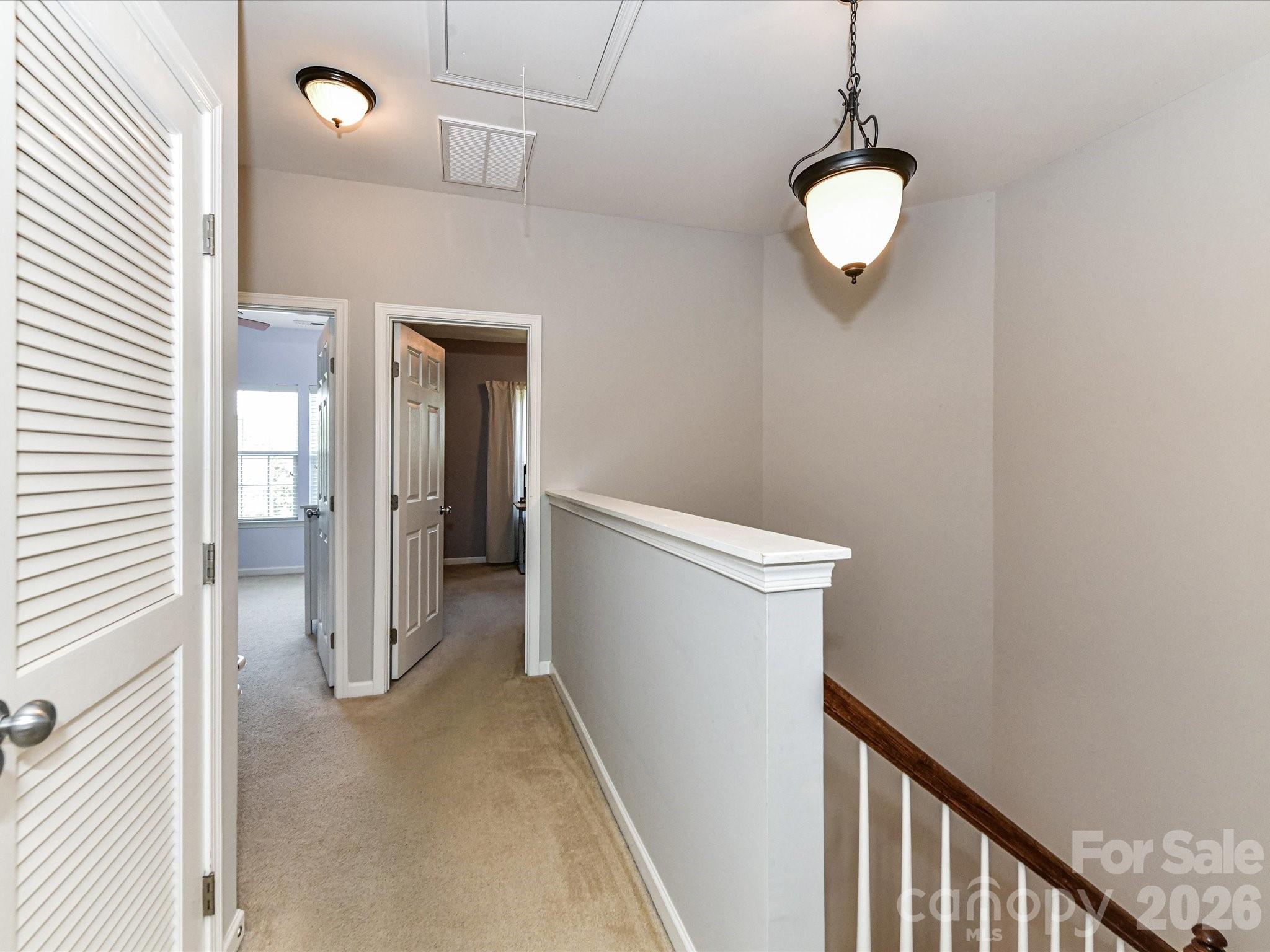 756 Naramore Street Davidson, NC 28036 - Photo 28 of 44 a view of a hallway with closet