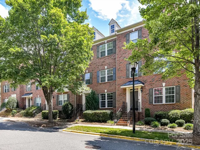 a front view of a building with street view