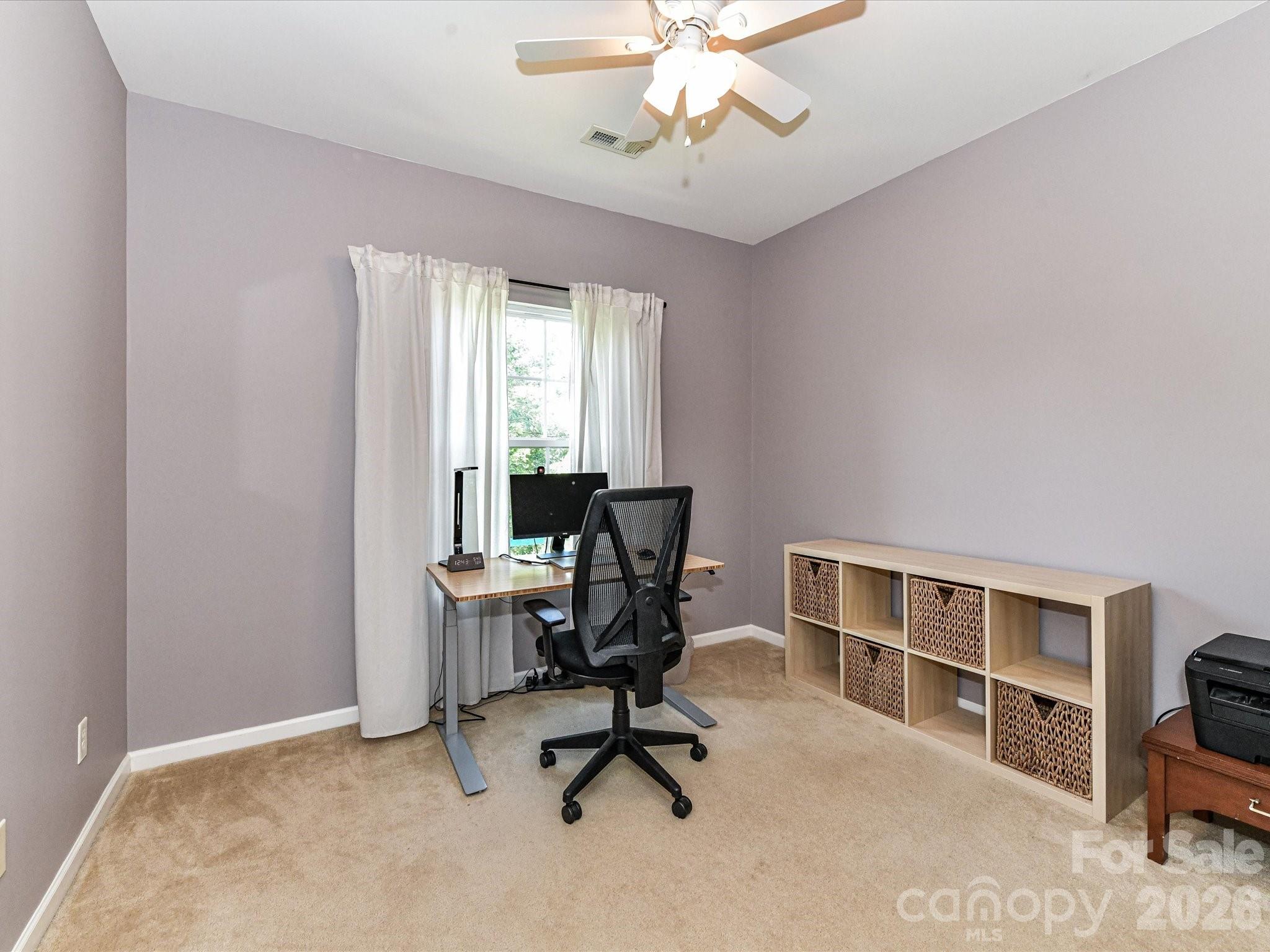 756 Naramore Street Davidson, NC 28036 - Photo 36 of 44 a view of a workspace with furniture and a window
