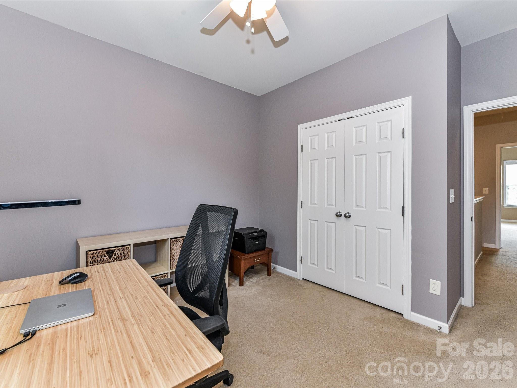756 Naramore Street Davidson, NC 28036 - Photo 37 of 44 a view of a workspace with furniture and a bedroom