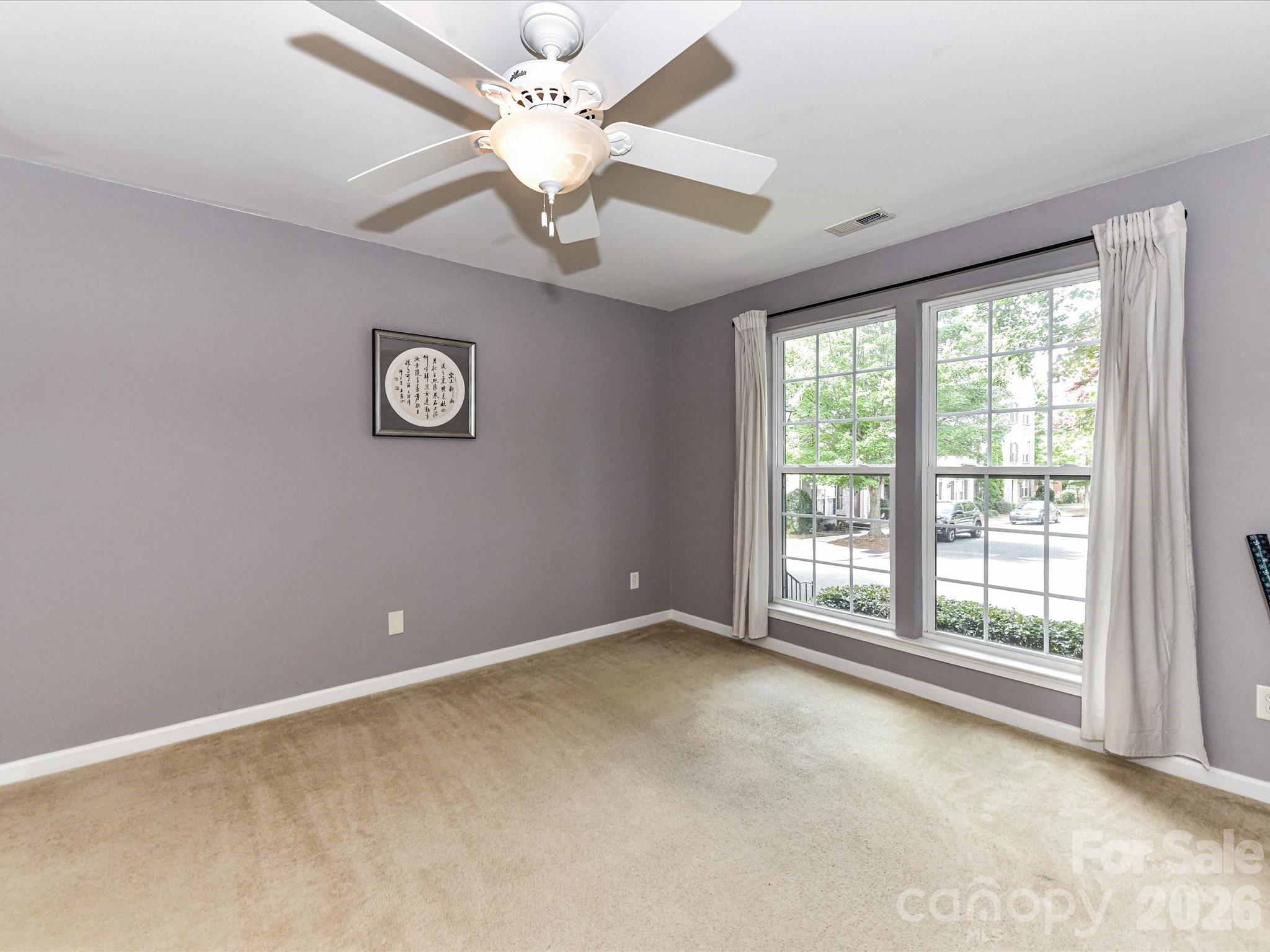 756 Naramore Street Davidson, NC 28036 - Photo 9 of 44 a view of an empty room with a window