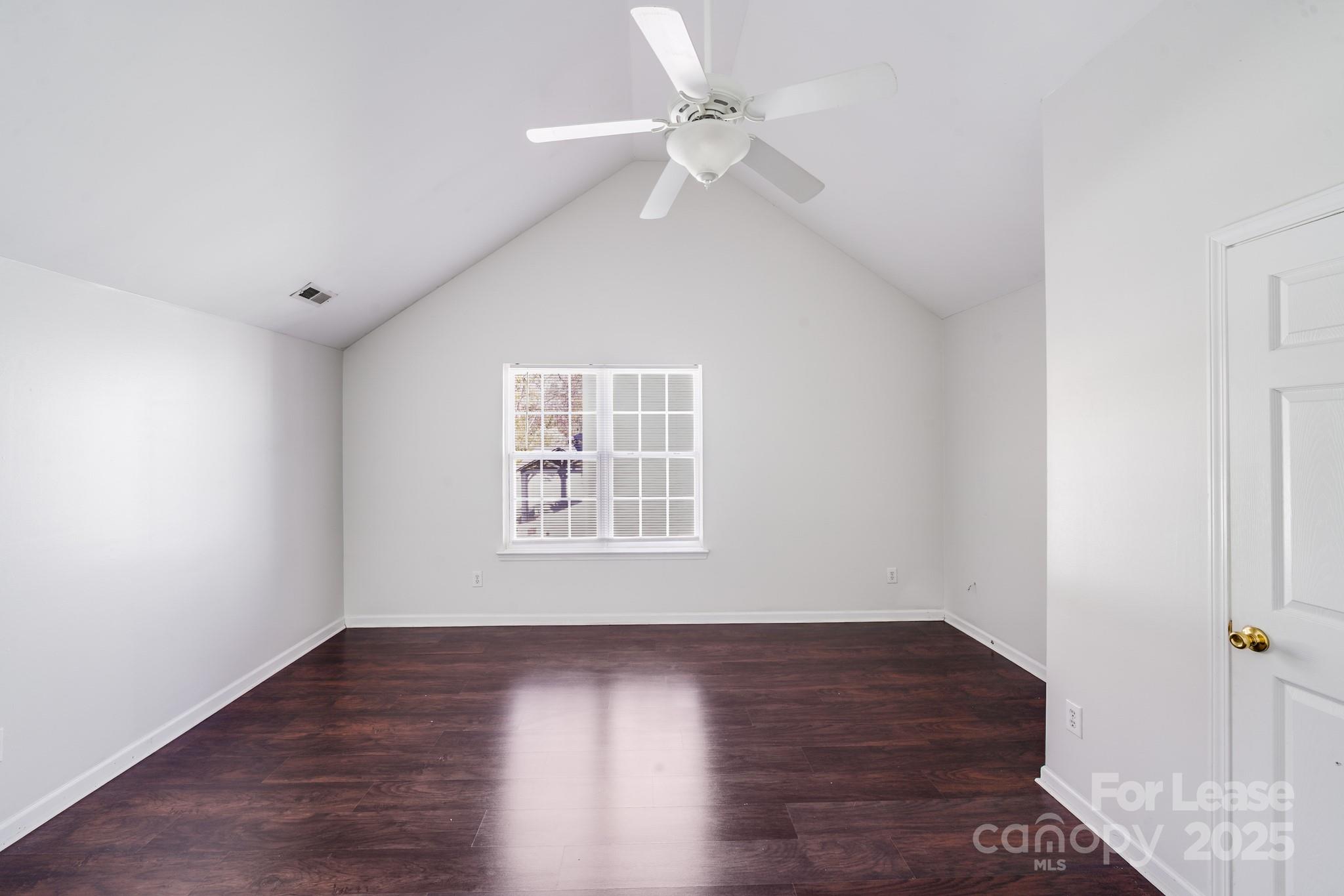1427 Jabbok Place Northwest Concord, NC 28027 - Photo 26 of 30 wooden floor in an empty room with a window