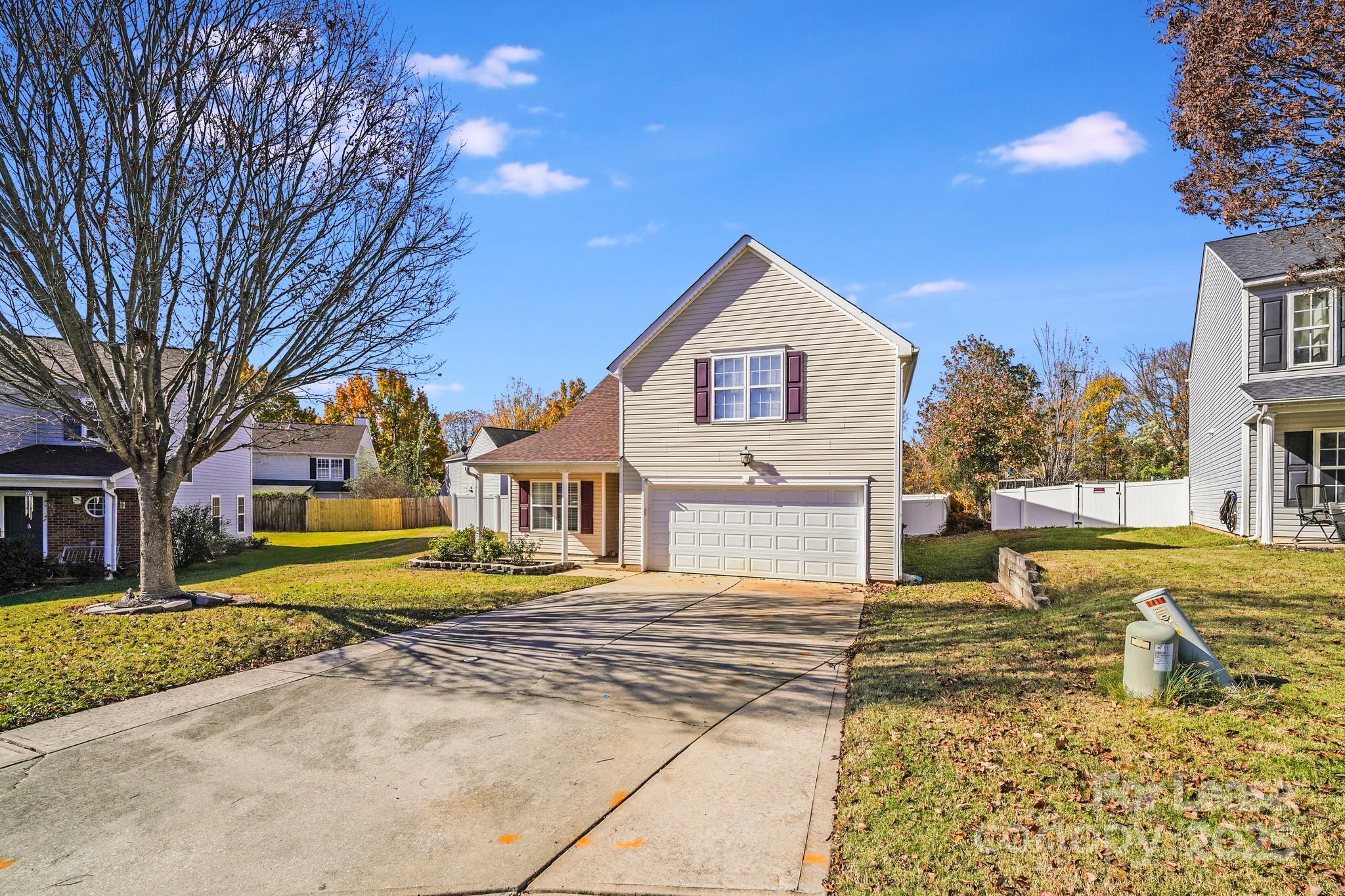 1427 Jabbok Place Northwest Concord, NC 28027 - Photo 28 of 30 a front view of a house with a yard
