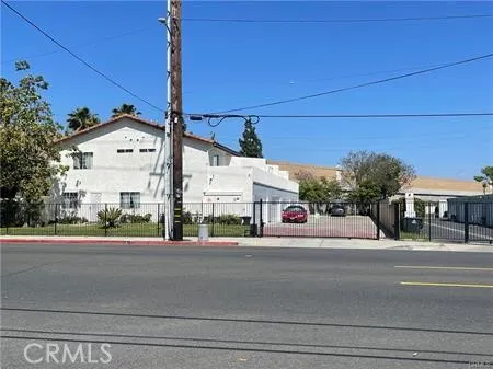 a view of a street with houses