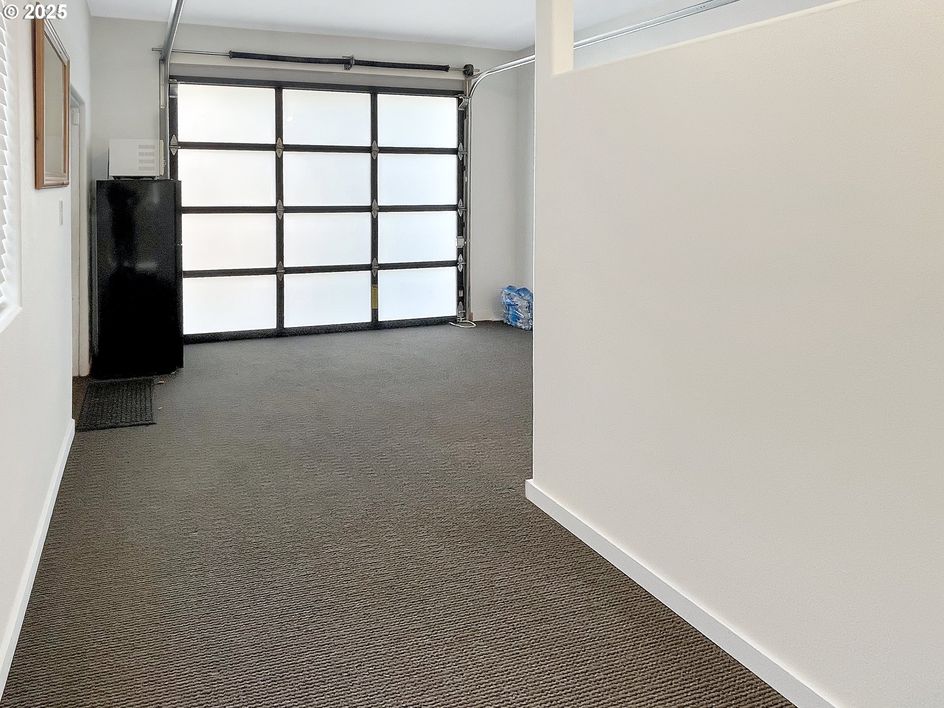 4535 Southwest Laurelwood Avenue Portland, OR 97225 - Photo 10 of 10 an empty room with windows
