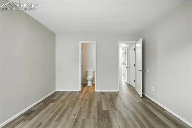 a view of wooden floor in an empty room