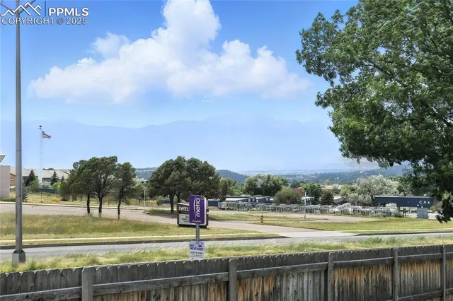 a view of a terrace with a garden