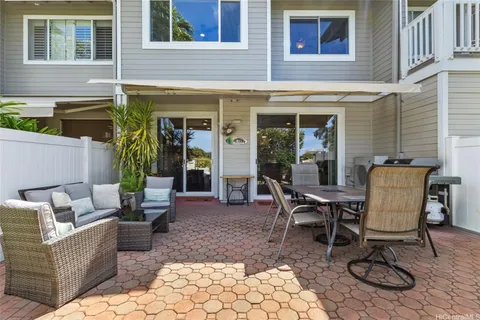 a view of a dinning tables and chair in the patio