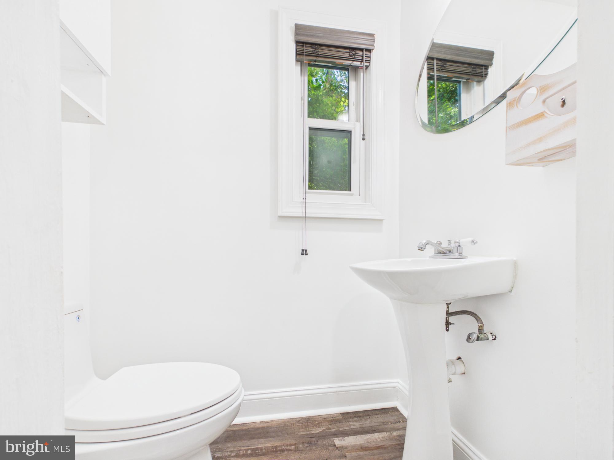 5512 Kathleen Place Springfield, VA 22151 - Photo 23 of 42 Bright and airy bathroom retreat.