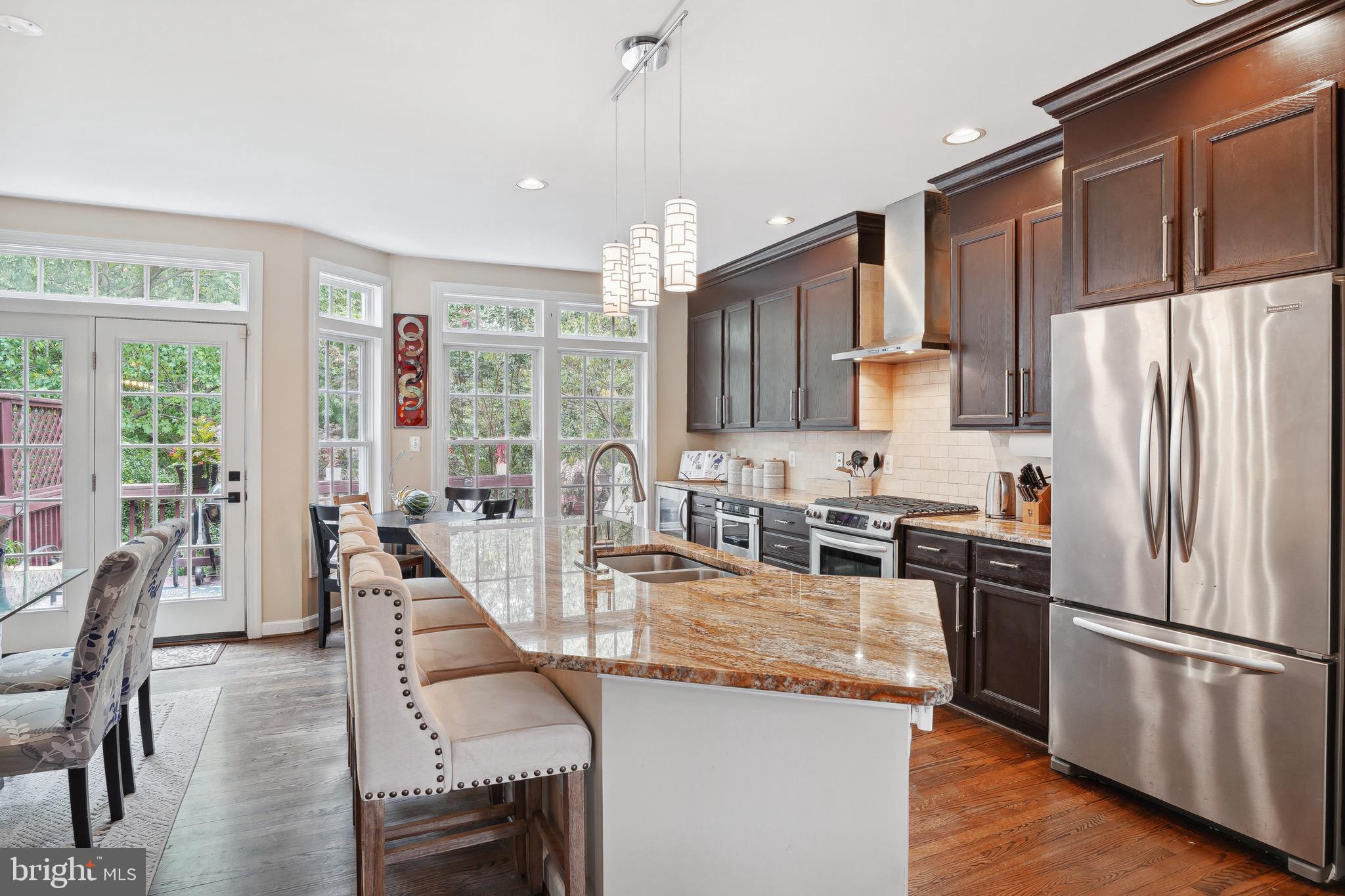 6667 Debra Lu Way Springfield, VA 22150 - Photo 4 of 15 Large, open kitchen and dining room