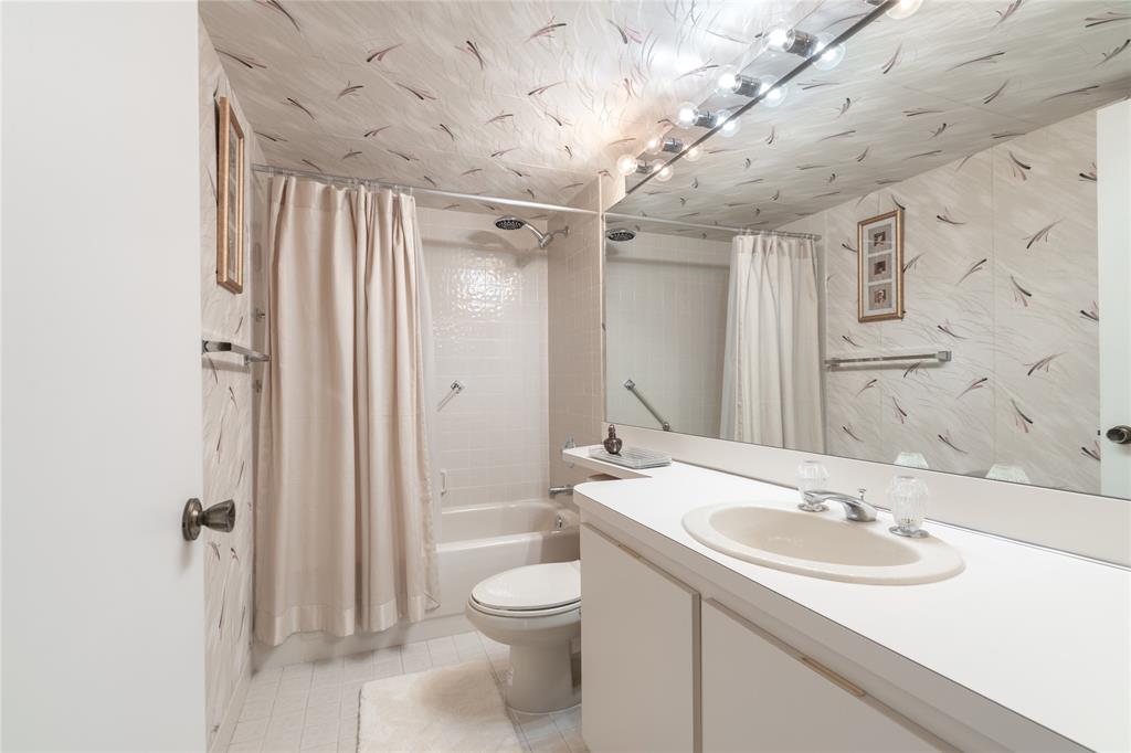 15075 Witney Road, Unit A303 Delray Beach, FL 33484 - Photo 8 of 26 a bathroom with a sink toilet double vanity and shower