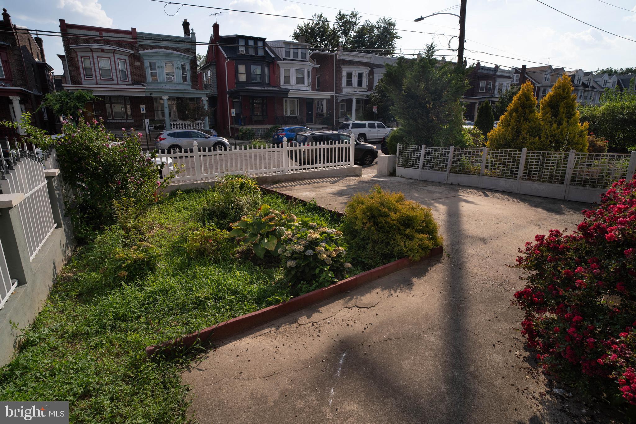 1227 Harrison Street Philadelphia, PA 19124 - Photo 3 of 38 a view of a house with backyard and sitting area