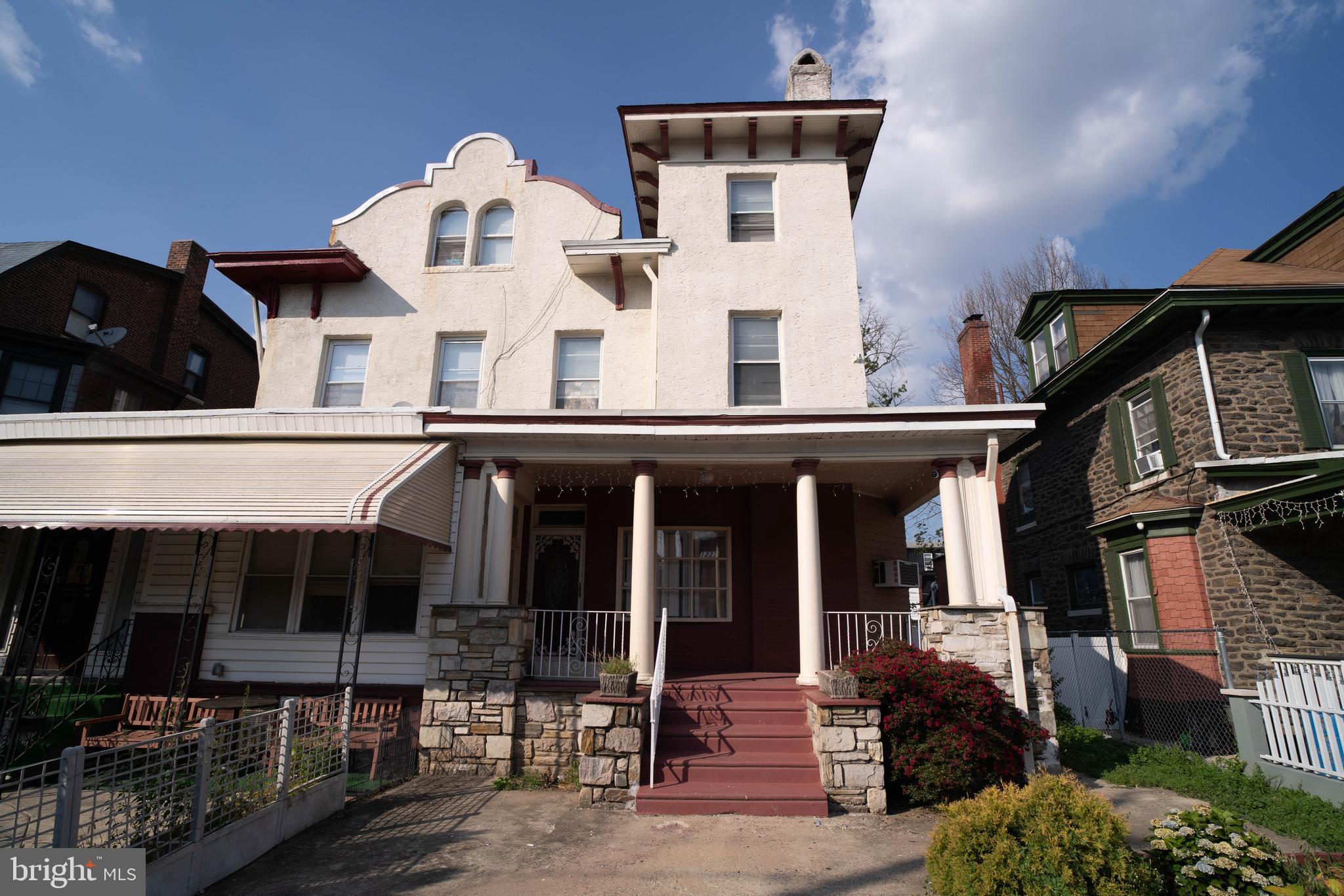 1227 Harrison Street Philadelphia, PA 19124 - Photo 4 of 38 a view of a building with sitting area