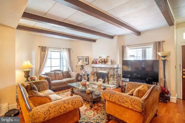 a living room with furniture and a couch