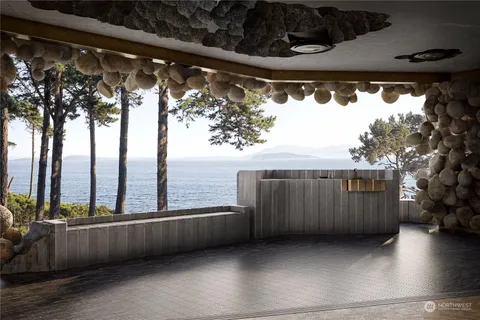 a view of balcony with furniture