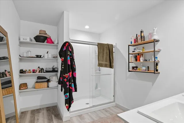 a view of a entryway with storage and utility racks