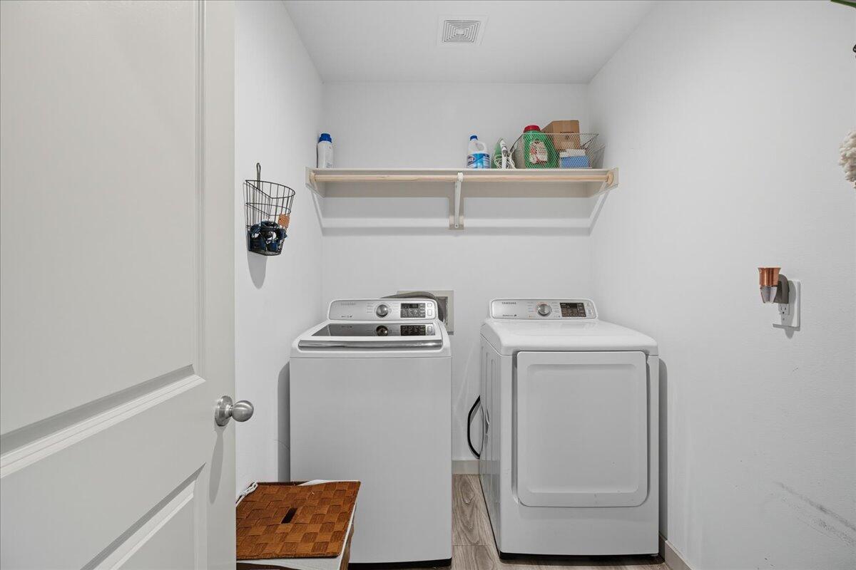 2309 149th Street Lubbock, TX 79423 - Photo 27 of 31 a utility room with dryer and washer