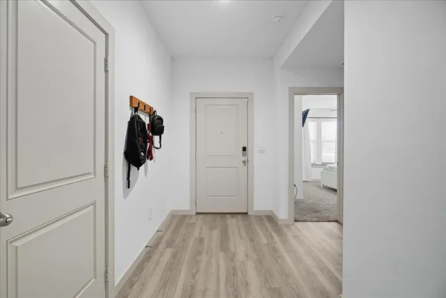 a view of a bathroom from a hallway