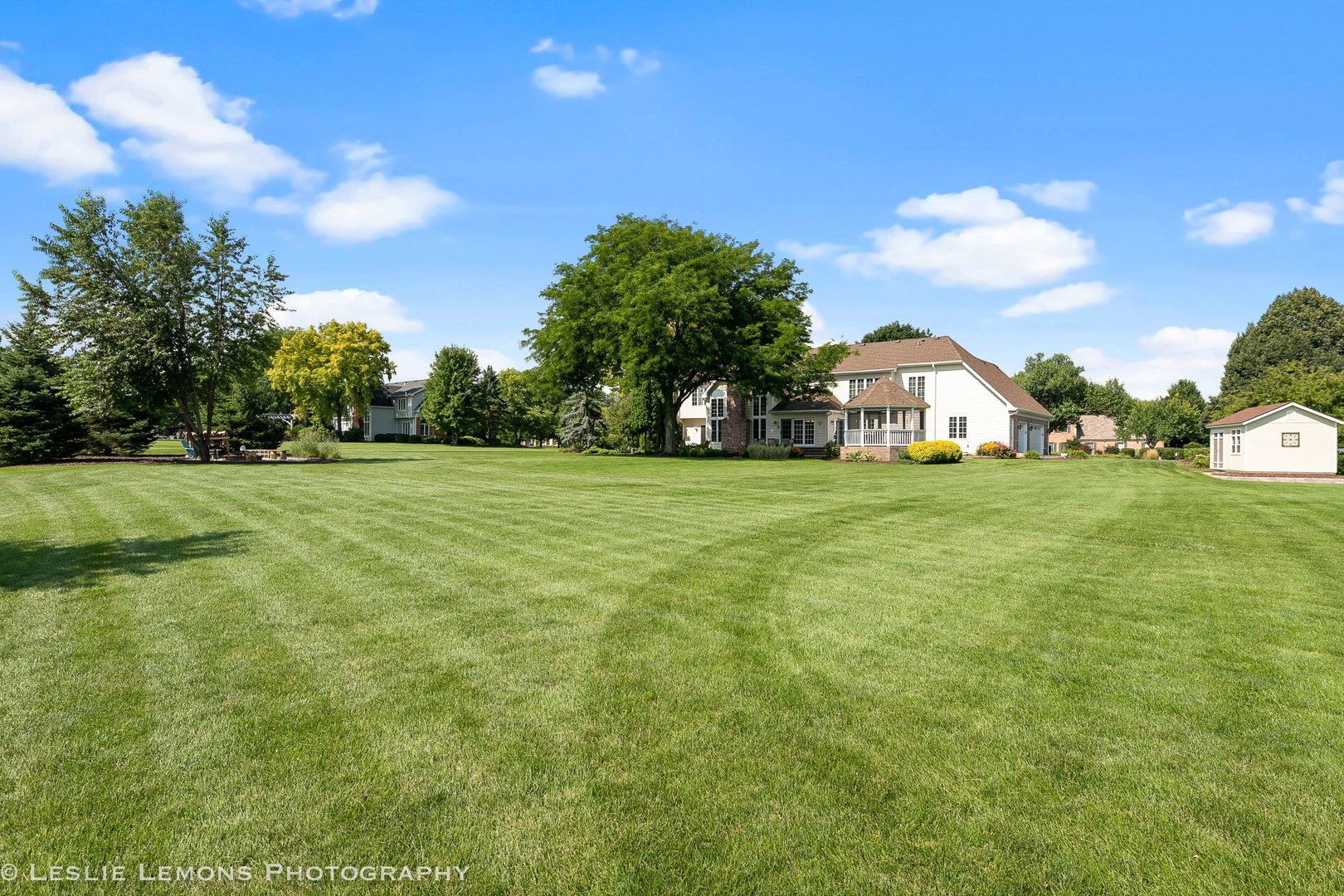 5N189 Grey Barn Road St. Charles, IL 60175 - Photo 7 of 15 a view of a green field with house in the background