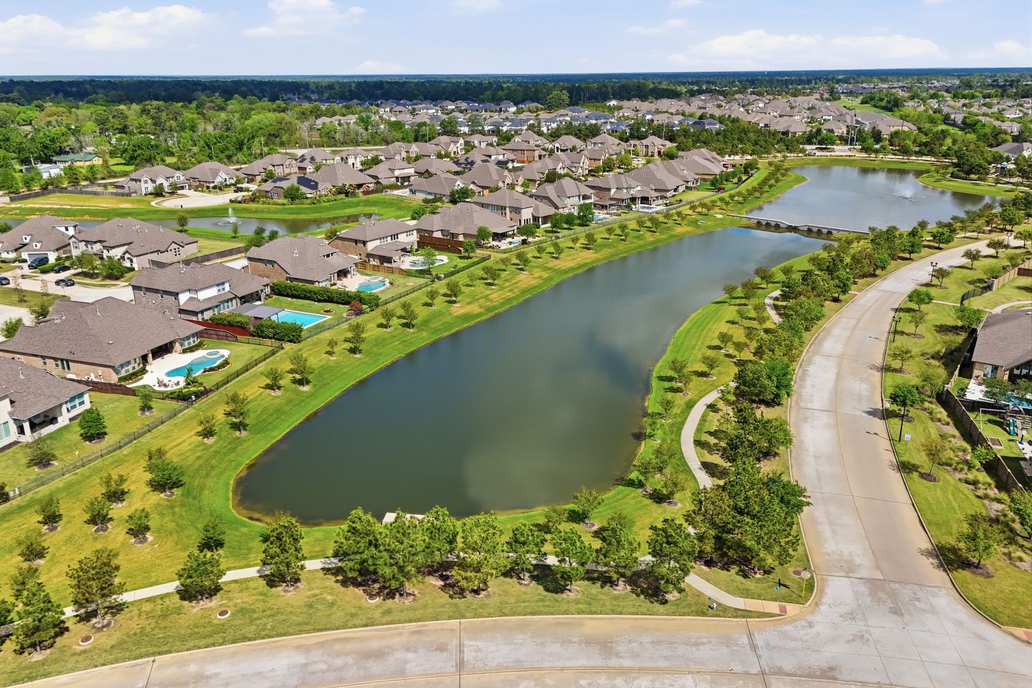 24423 Morningside Terrace Tomball, TX 77375 - Photo 32 of 47 a view of a lake with a