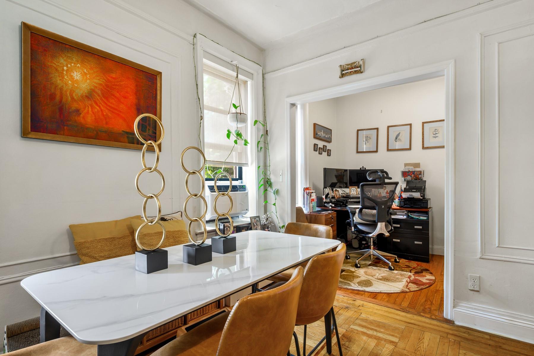 7101 Colonial Road, Unit R1B Brooklyn, NY 11209 - Photo 4 of 10 a view of a dining room with furniture and wooden floor
