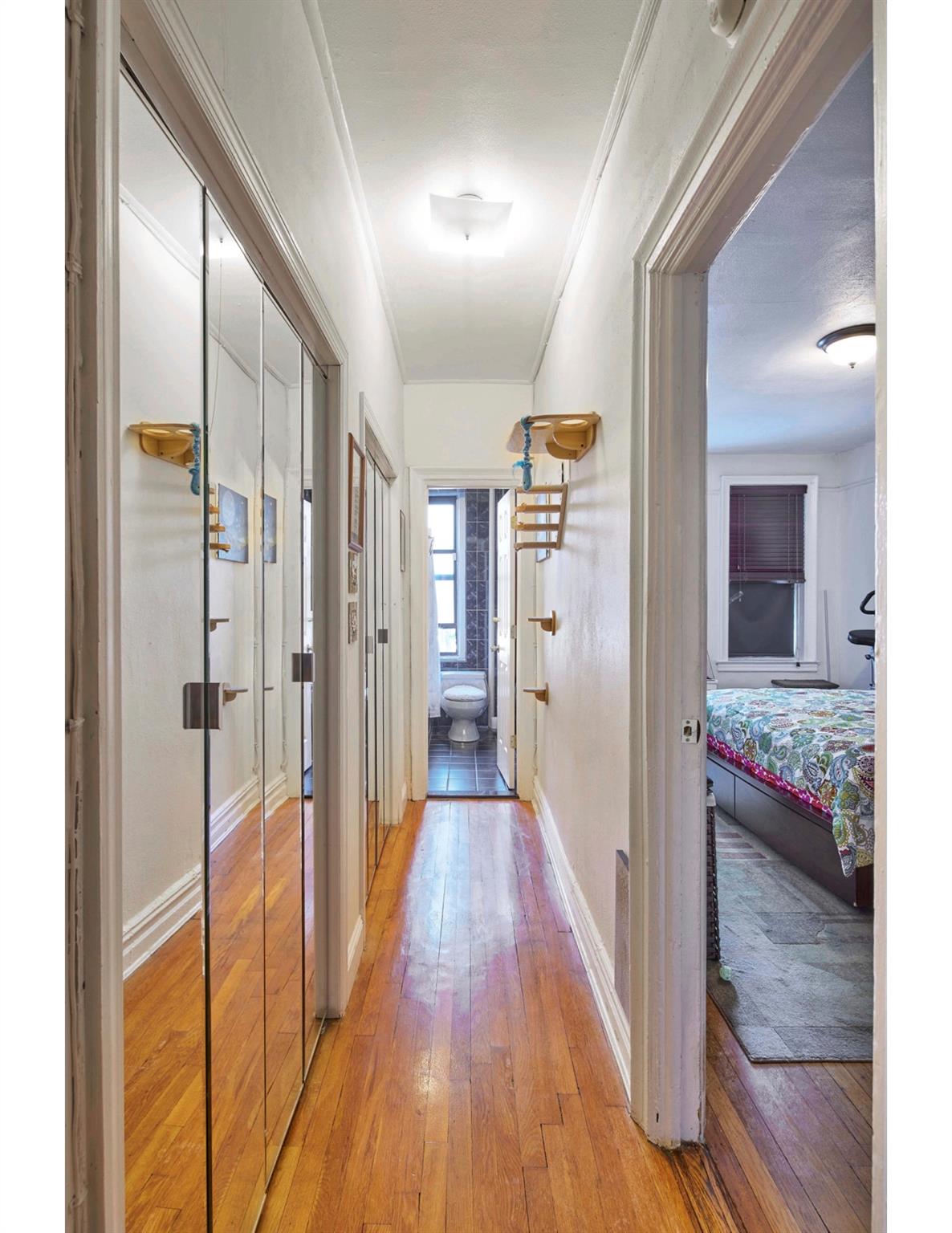 7101 Colonial Road, Unit R1B Brooklyn, NY 11209 - Photo 7 of 10 a view of a hallway with wooden floor