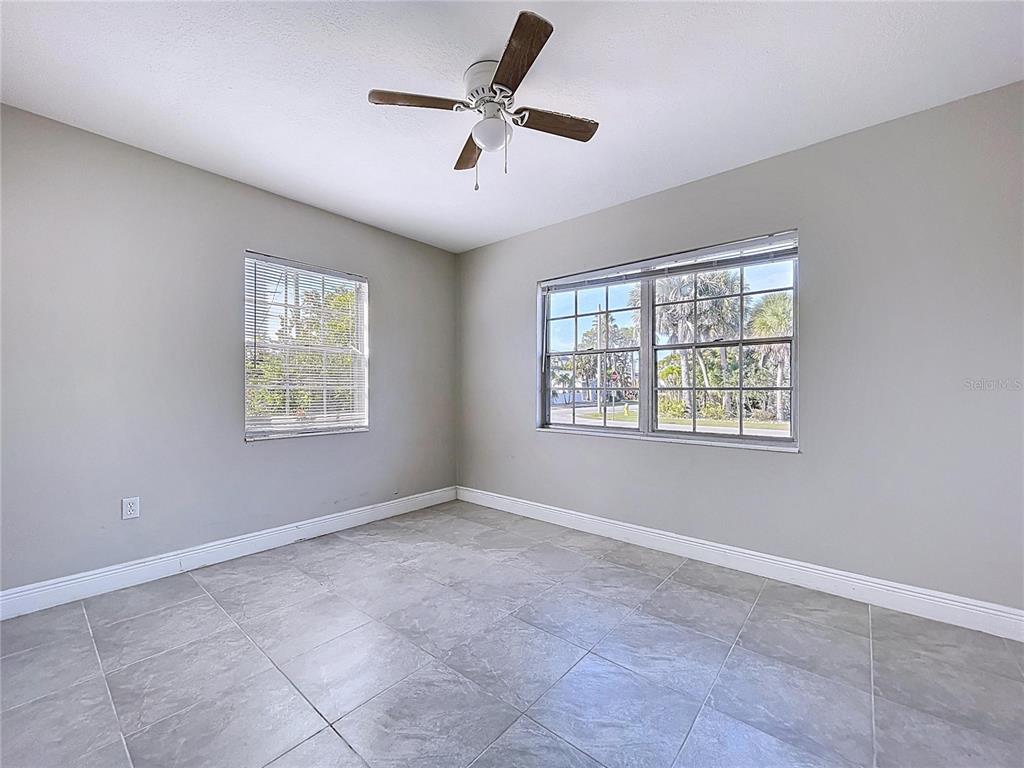 501 Spring Avenue Anna Maria, FL 34216 - Photo 19 of 49 a view of an empty room with a window