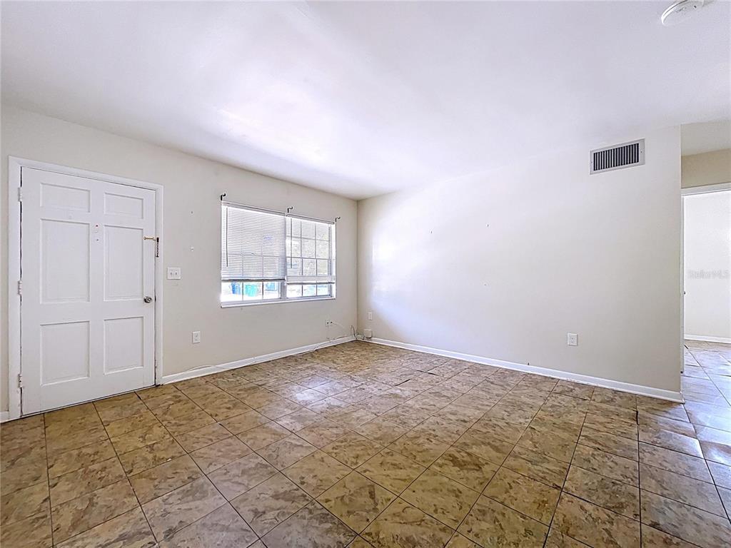 501 Spring Avenue Anna Maria, FL 34216 - Photo 25 of 49 an empty room with windows