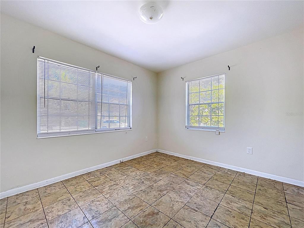 501 Spring Avenue Anna Maria, FL 34216 - Photo 35 of 49 an empty room with windows