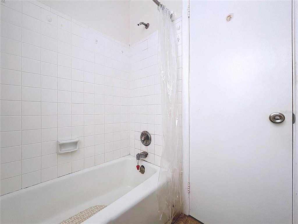 501 Spring Avenue Anna Maria, FL 34216 - Photo 39 of 49 a bathroom with a bathtub