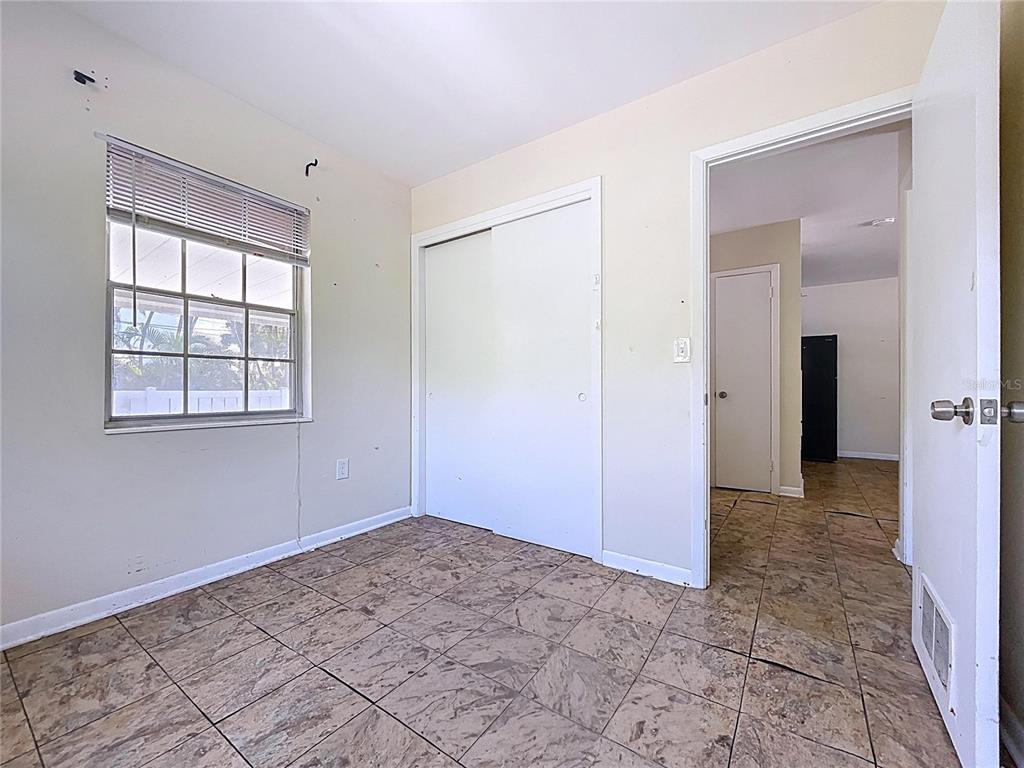 501 Spring Avenue Anna Maria, FL 34216 - Photo 41 of 49 a view of an empty room with a window