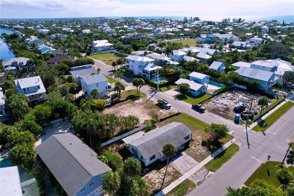 501 Spring Avenue Anna Maria, FL 34216 - Photo 46 of 49 an aerial view of residential houses with outdoor space