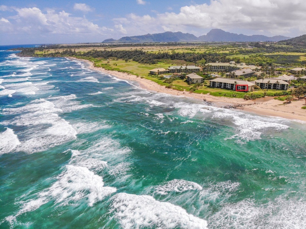 4330 Kauai Beach Drive, Unit G3 Lihue, HI 96766 - Photo 1 of 22 a view of a lake with houses