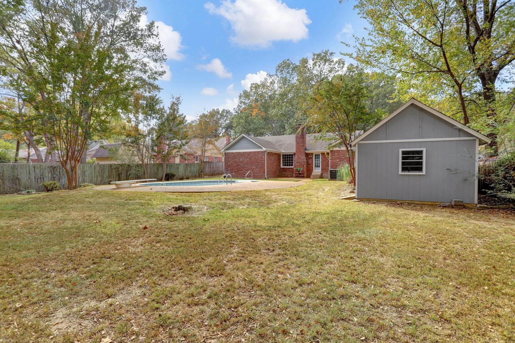 372 Dove Valley Road Collierville, TN 38017 - Photo 31 of 32 a view of a house with a yard