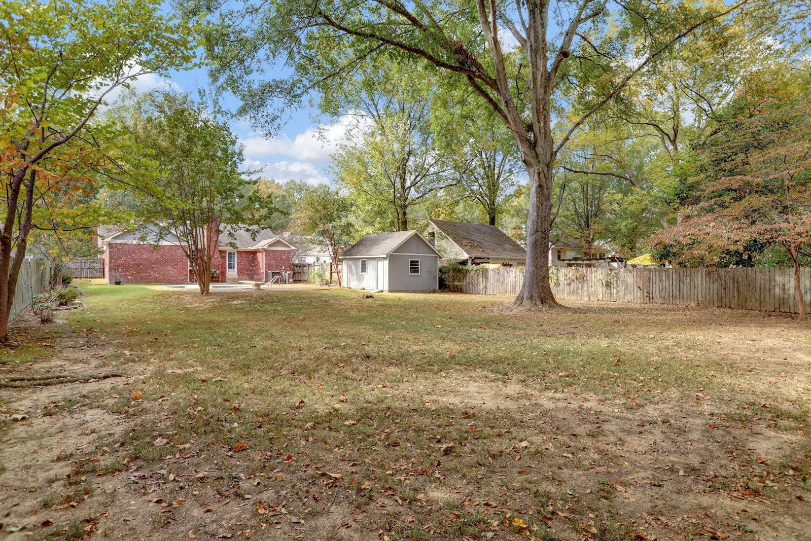 372 Dove Valley Road Collierville, TN 38017 - Photo 32 of 32 a view of a house with a yard