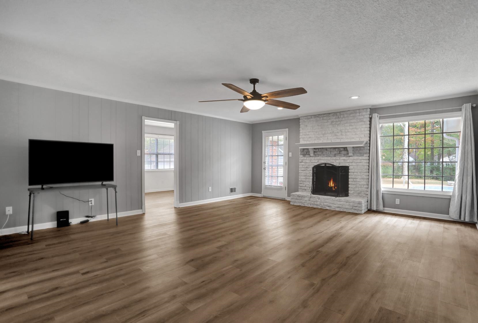372 Dove Valley Road Collierville, TN 38017 - Photo 7 of 32 a view of a livingroom with a fireplace a window and a fireplace
