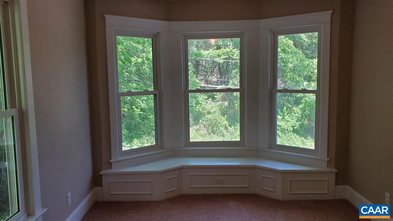 3007 Morgantown Road Charlottesville, VA 22903 - Photo 18 of 30 a room with a window and a bed
